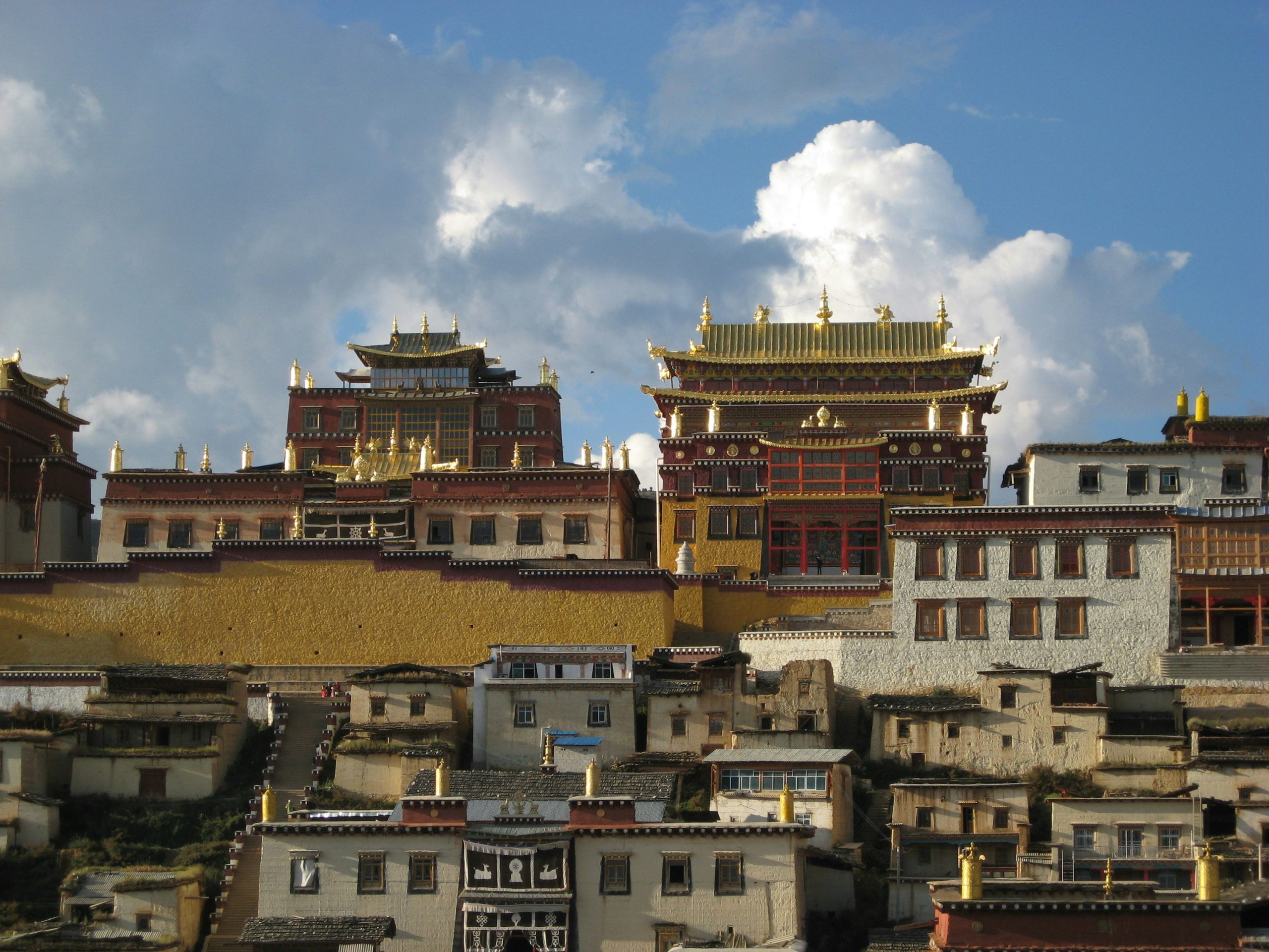 experience the tranquility of a tibetan monastery visit and immerse yourself in its rich cultural heritage and spiritual surroundings.